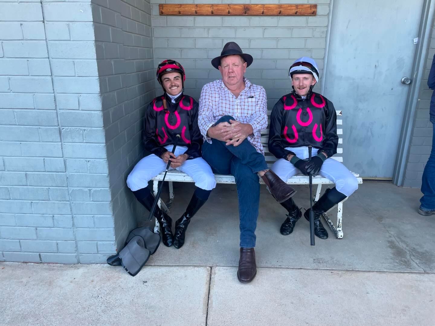 Brett Cavanough with jockeys Braith Nock (left) and Cobi Vitler.